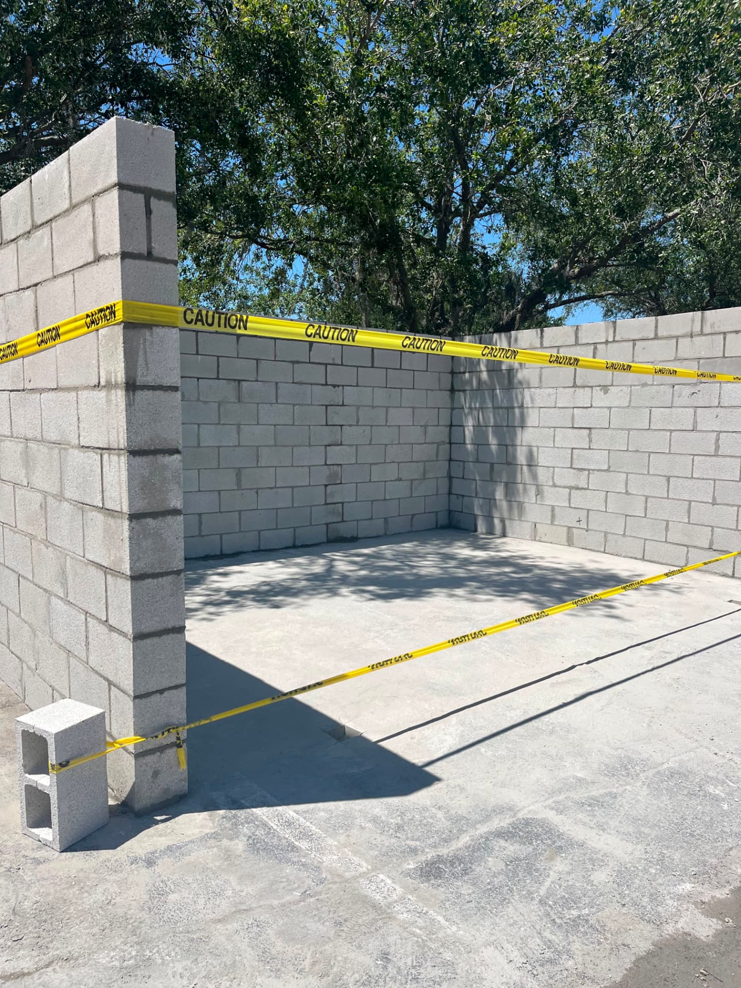 Finished block enclosure with poured concrete slab